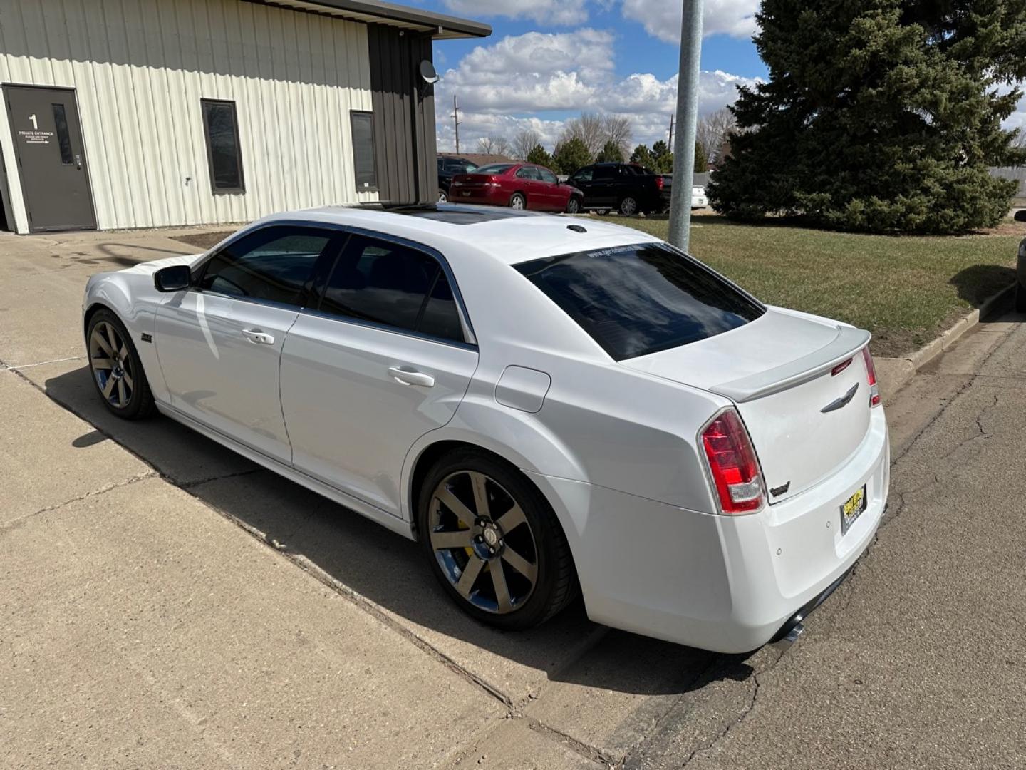 2012 WHITE CHRYSLER 300 SRT-8 (2C3CCAFJ5CH) with an 6.4L engine, Automatic transmission, located at 1030 S. 22nd St., Bismarck, ND, 58504, (701) 258-0022, 46.793560, -100.758118 - 6.4 Liter SRT-8 YELLOW BRAKE CALIBER COVERS-AUTO- Photo#1