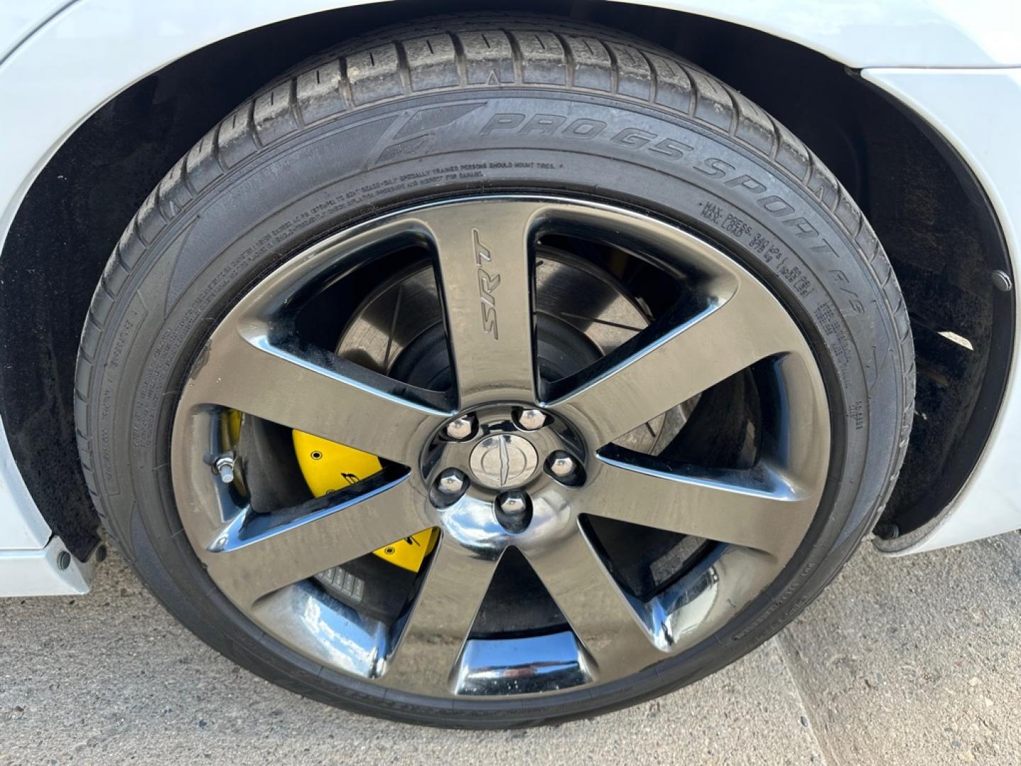 2012 WHITE CHRYSLER 300 SRT-8 (2C3CCAFJ5CH) with an 6.4L engine, Automatic transmission, located at 1030 S. 22nd St., Bismarck, ND, 58504, (701) 258-0022, 46.793560, -100.758118 - 6.4 Liter SRT-8 YELLOW BRAKE CALIBER COVERS-AUTO- Photo#6