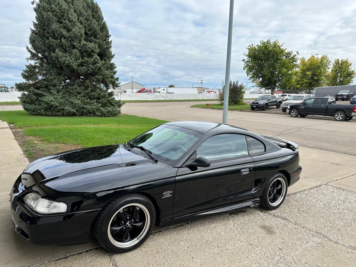 1996 BLACK FORD MUSTANG GT (1FALP42X5TF) with an 4.6L engine, Automatic transmission, located at 1030 S. 22nd St., Bismarck, ND, 58504, (701) 258-0022, 46.793560, -100.758118 - 4.6 LITER, AUTO, BLACK BULLET WHEELS, BLORA SIDE EXHAUSR, 35OOO ACTUAL MILES, LIKE NEW- Photo#0