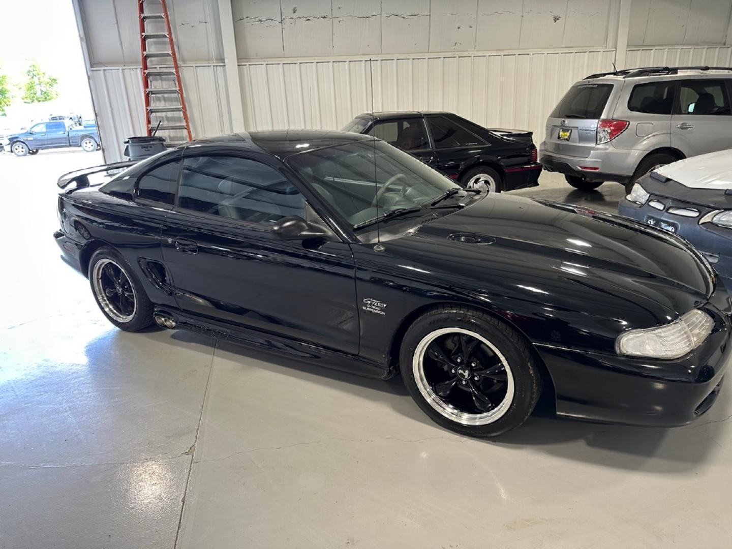 1996 BLACK FORD MUSTANG GT (1FALP42X5TF) with an 4.6L engine, Automatic transmission, located at 1030 S. 22nd St., Bismarck, ND, 58504, (701) 258-0022, 46.793560, -100.758118 - 4.6 LITER, AUTO, BLACK BULLET WHEELS, BLORA SIDE EXHAUSR, 35OOO ACTUAL MILES, LIKE NEW- Photo#1