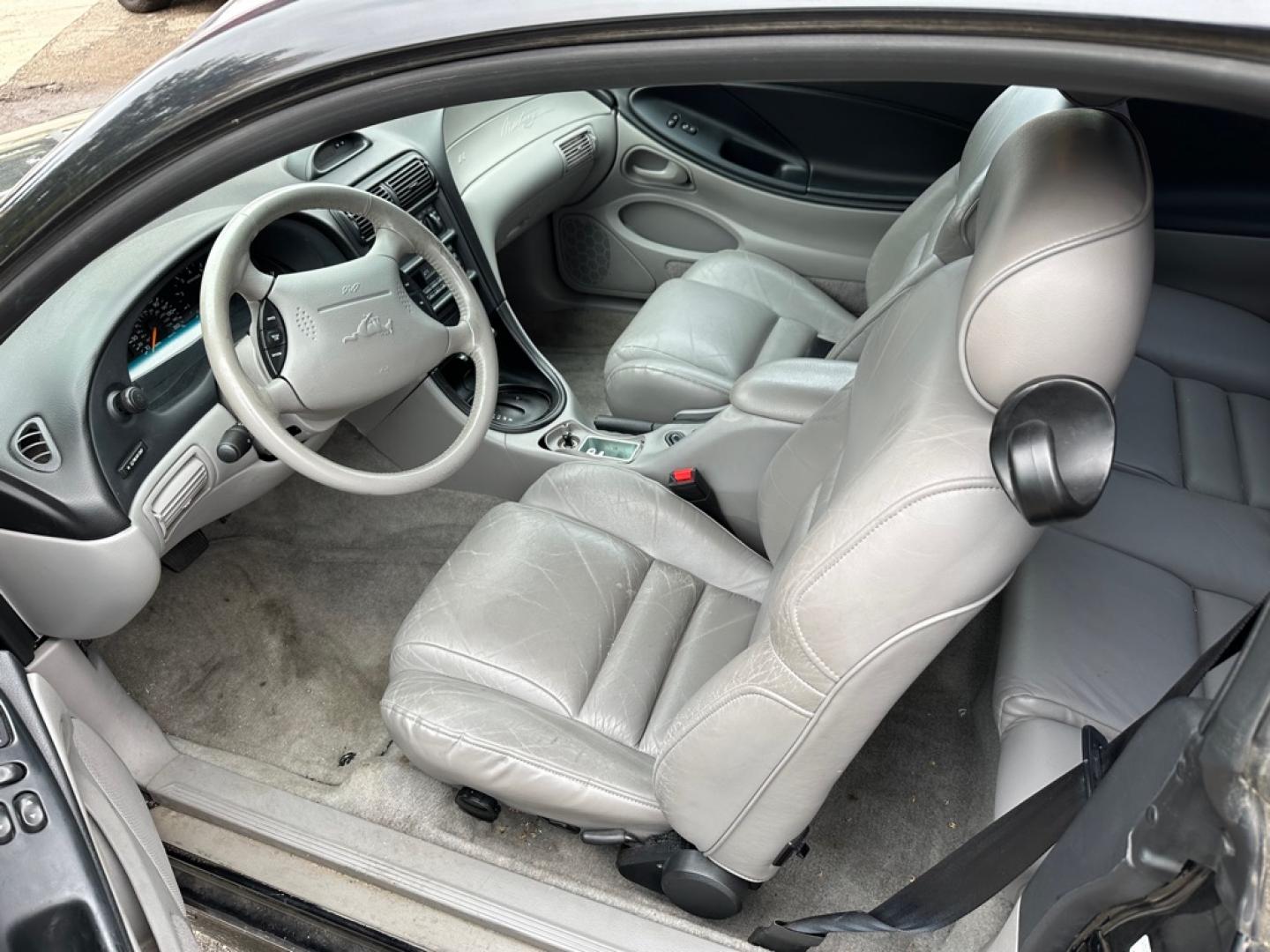 1996 BLACK FORD MUSTANG GT (1FALP42X5TF) with an 4.6L engine, Automatic transmission, located at 1030 S. 22nd St., Bismarck, ND, 58504, (701) 258-0022, 46.793560, -100.758118 - 4.6 LITER, AUTO, BLACK BULLET WHEELS, BLORA SIDE EXHAUSR, 35OOO ACTUAL MILES, LIKE NEW- Photo#6