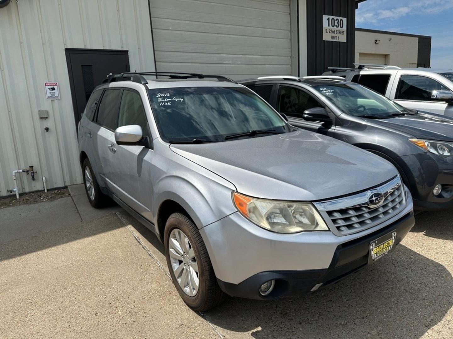2013 SILVER SUBARU FORESTER 2.5X PREMIUM (JF2SHADC8DH) with an 2.5L engine, Automatic transmission, located at 1030 S. 22nd St., Bismarck, ND, 58504, (701) 258-0022, 46.793560, -100.758118 - NEW TRANS WITH 36 MONTHH WARRANTY. NEW TIRES AND BRAKES- Photo#1