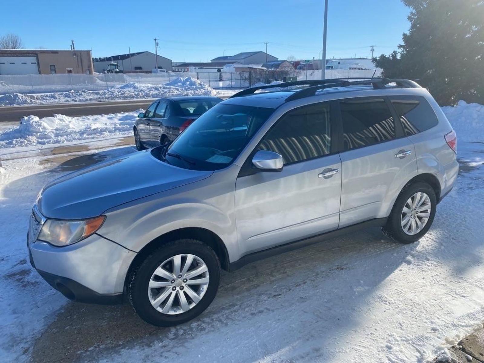 2013 SILVER SUBARU FORESTER 2.5X PREMIUM (JF2SHADC8DH) with an 2.5L engine, Automatic transmission, located at 1030 S. 22nd St., Bismarck, ND, 58504, (701) 258-0022, 46.793560, -100.758118 - Photo #1