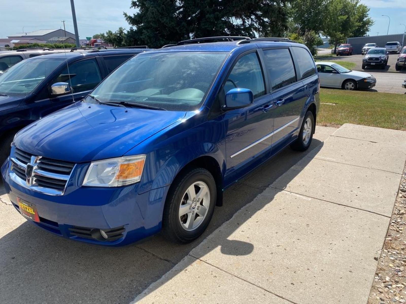 2010 BLUE DODGE GRAND CARAVAN SXT (2D4RN5D18AR) with an 3.8L engine, Automatic transmission, located at 1030 S. 22nd St., Bismarck, ND, 58504, (701) 258-0022, 46.793560, -100.758118 - Photo #0