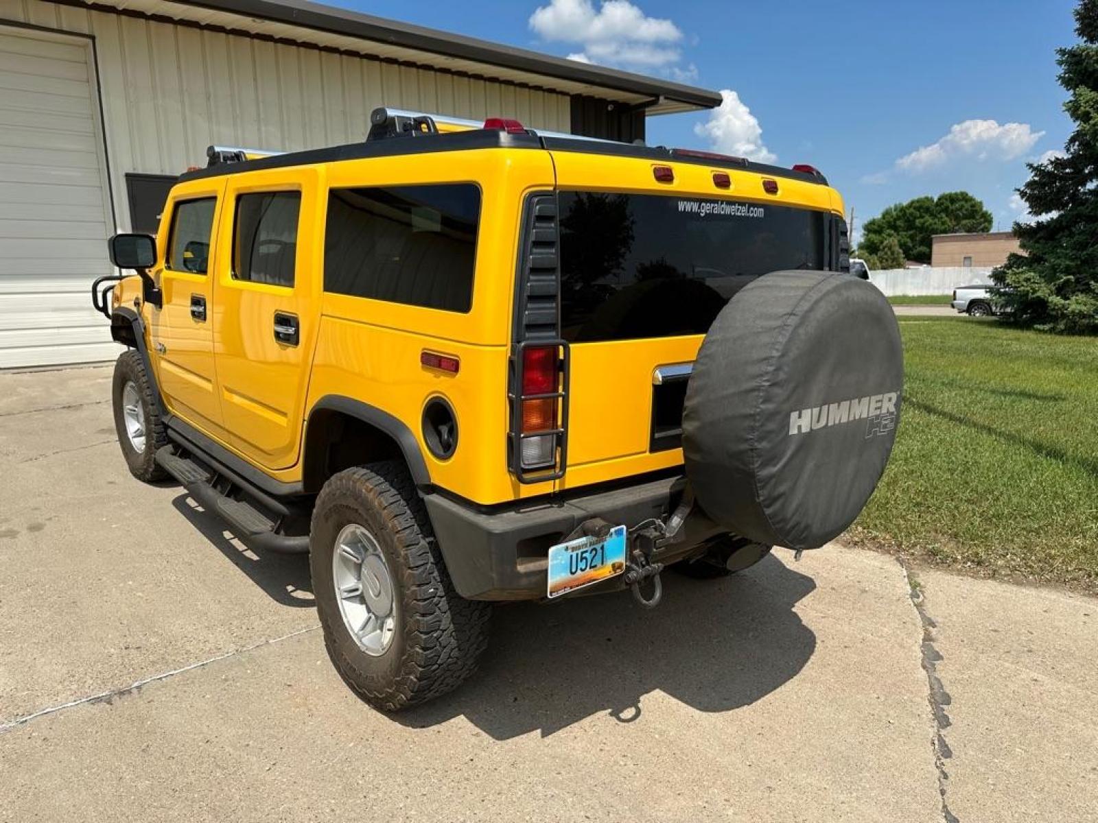 2003 YELLOW HUMMER H2 BASE (5GRGN23U03H) with an 6.0L engine, Automatic transmission, located at 1030 S. 22nd St., Bismarck, ND, 58504, (701) 258-0022, 46.793560, -100.758118 - Excellent Conddition - Photo #1