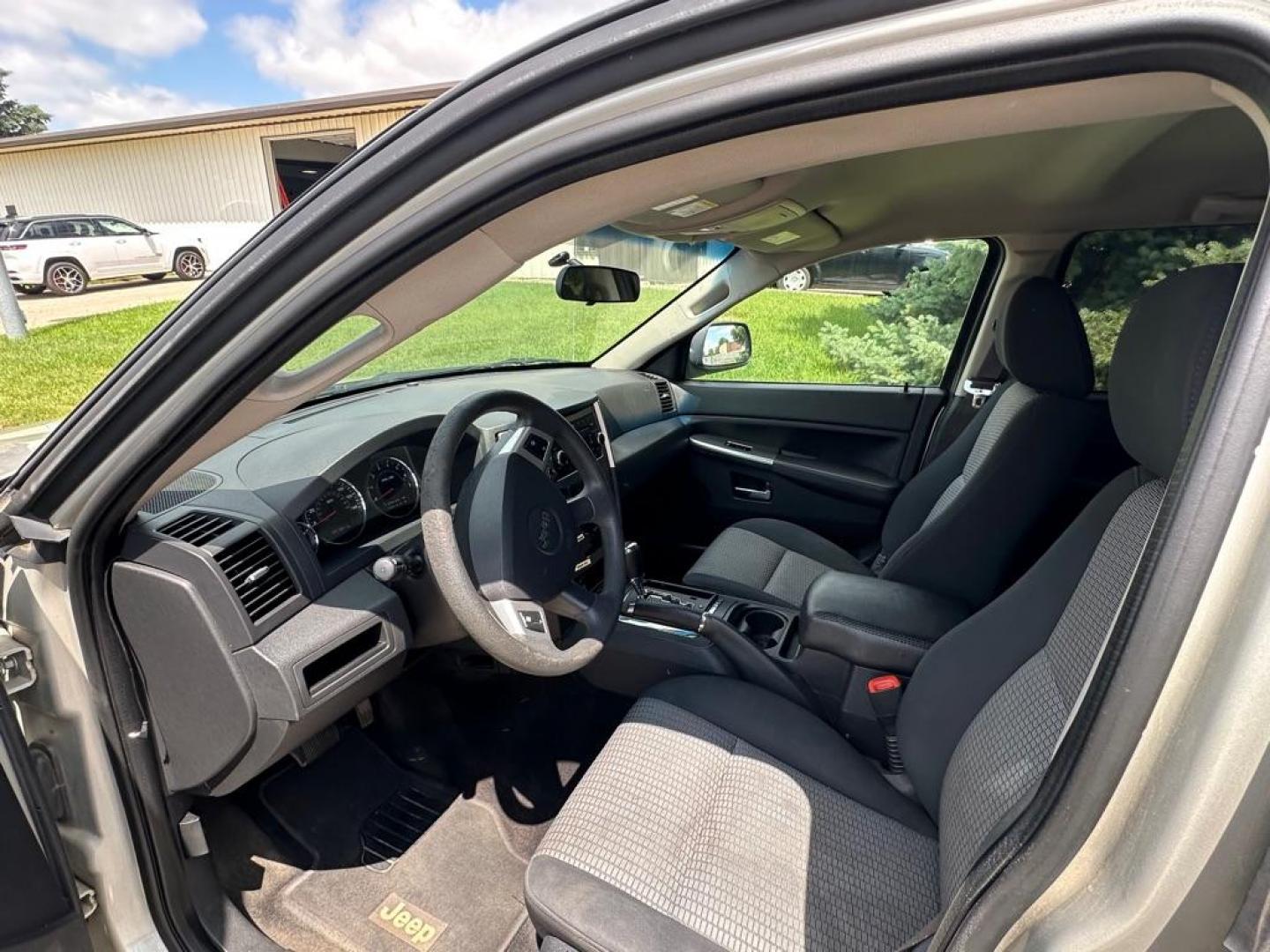 2010 JEEP GRAND CHEROKEE LAREDO (1J4PR4GK8AC) with an 3.7L engine, Automatic transmission, located at 1030 S. 22nd St., Bismarck, ND, 58504, (701) 258-0022, 46.793560, -100.758118 - NICE CLEAN JEEP - Photo#4