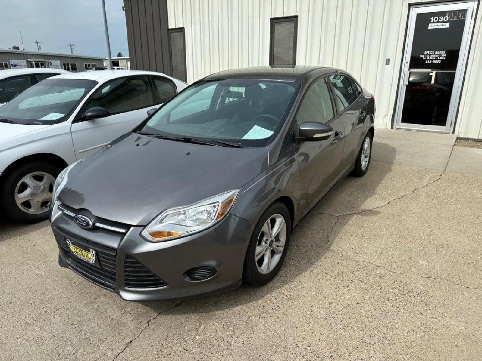 2014 BLUE FORD FOCUS SE (1FADP3F25EL) with an 2.0L engine, Automatic transmission, located at 1030 S. 22nd St., Bismarck, ND, 58504, (701) 258-0022, 46.793560, -100.758118 - Photo #0