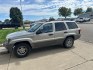 2004 SILVER JEEP GRAND CHEROKEE LAREDO (1J4GW48S14C) with an 4.0L engine, Automatic transmission, located at 1030 S. 22nd St., Bismarck, ND, 58504, (701) 258-0022, 46.793560, -100.758118 - INLINE 6 , AUTO 4X4- Photo#0