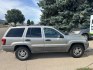 2004 SILVER JEEP GRAND CHEROKEE LAREDO (1J4GW48S14C) with an 4.0L engine, Automatic transmission, located at 1030 S. 22nd St., Bismarck, ND, 58504, (701) 258-0022, 46.793560, -100.758118 - INLINE 6 , AUTO 4X4- Photo#1