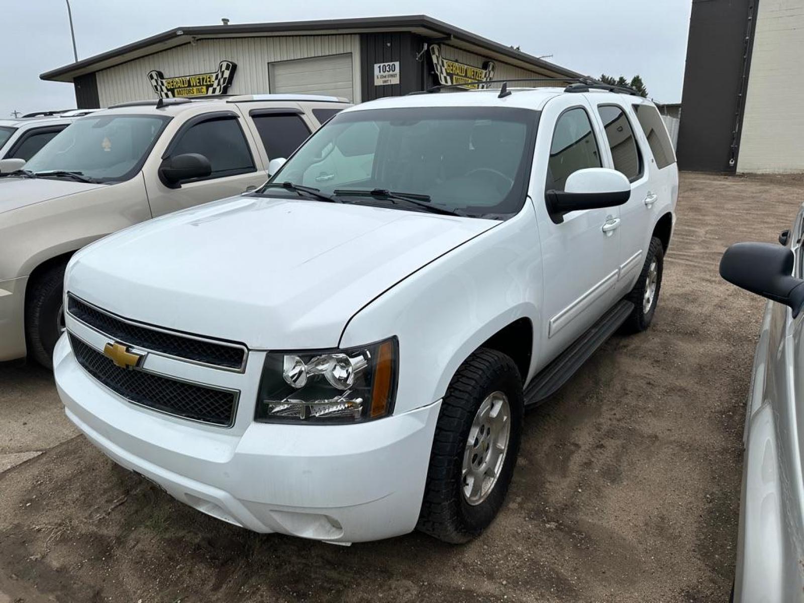 2012 WHITE CHEVROLET TAHOE 1500 LT (1GNSKBE05CR) with an 5.3L engine, Automatic transmission, located at 1030 S. 22nd St., Bismarck, ND, 58504, (701) 258-0022, 46.793560, -100.758118 - REBUILT TRANSMISSION - Photo #0