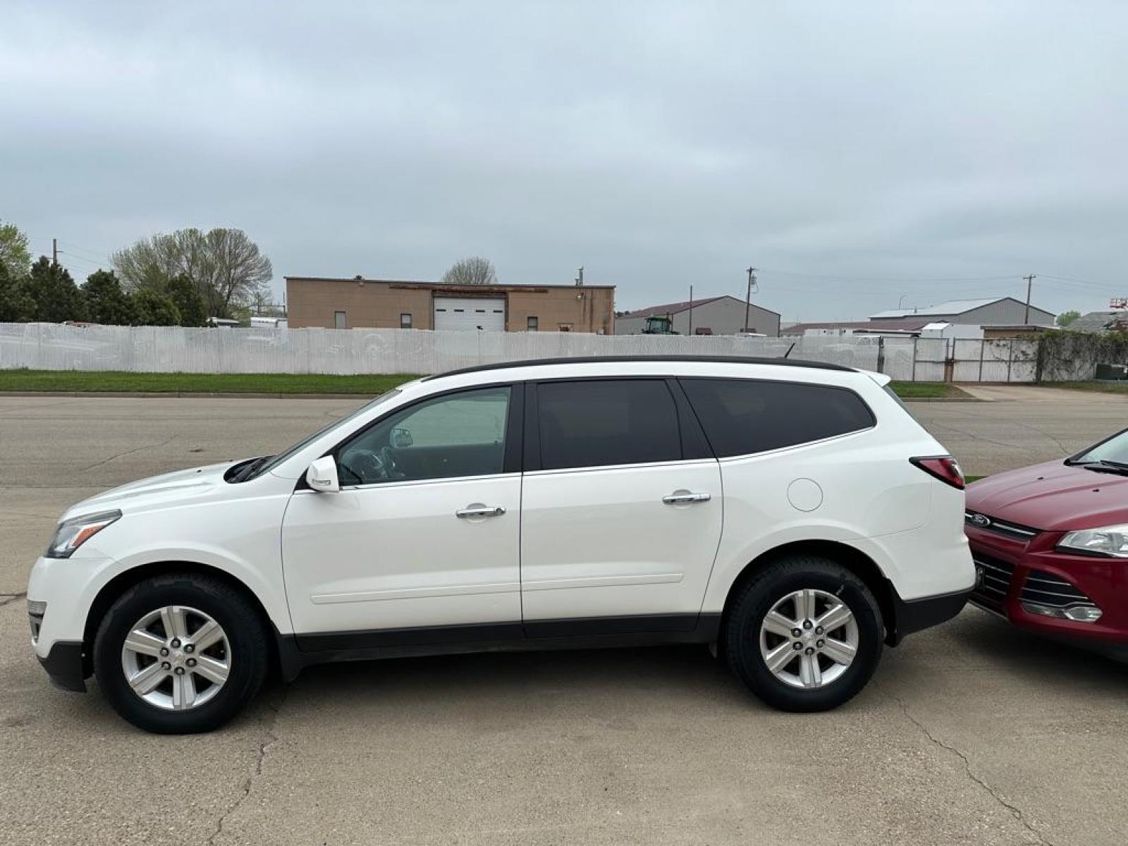2011 SILVER CHEVROLET TRAVERSE LT (1GNKVGED6BJ) with an 3.6L engine, Automatic transmission, located at 1030 S. 22nd St., Bismarck, ND, 58504, (701) 258-0022, 46.793560, -100.758118 - Photo #0
