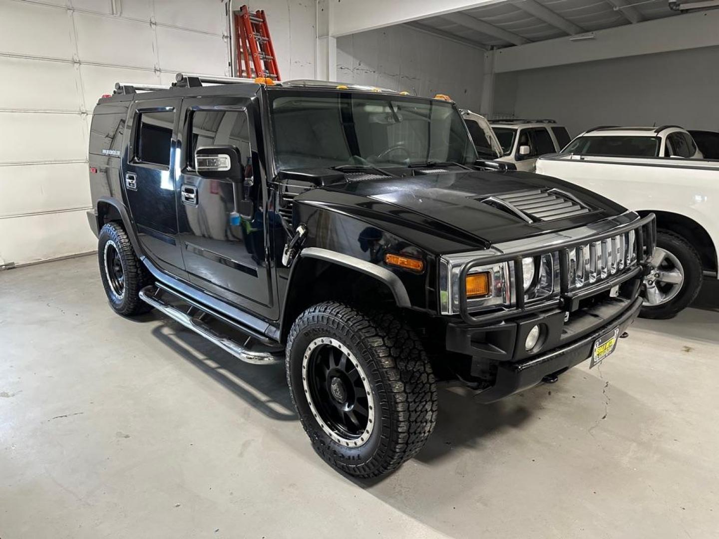 2007 HUMMER H2 (5GRGN23U17H) with an 6.0L engine, Automatic transmission, located at 1030 S. 22nd St., Bismarck, ND, 58504, (701) 258-0022, 46.793560, -100.758118 - New Tires, Rebuilt transmission w/ warranty. Above average condtion. Nice!!! - Photo#3