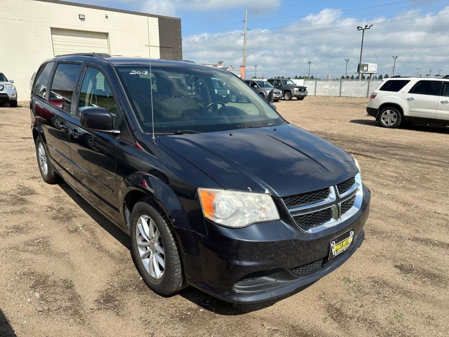 2013 DODGE GRAND CARAVAN SXT (2C4RDGCG3DR) with an 3.6L engine, Automatic transmission, located at 1030 S. 22nd St., Bismarck, ND, 58504, (701) 258-0022, 46.793560, -100.758118 - Photo#1