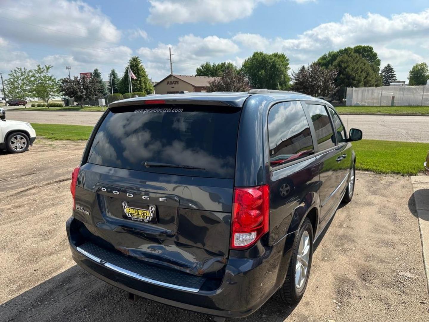 2013 DODGE GRAND CARAVAN SXT (2C4RDGCG3DR) with an 3.6L engine, Automatic transmission, located at 1030 S. 22nd St., Bismarck, ND, 58504, (701) 258-0022, 46.793560, -100.758118 - Photo#2