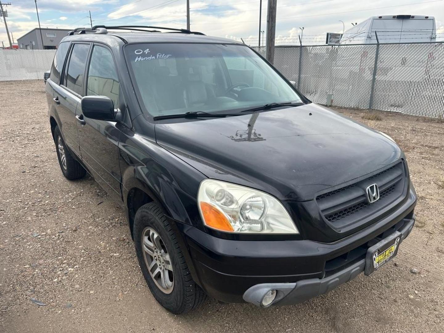 2004 HONDA PILOT EXL (5FNYF18504B) with an 3.5L engine, Automatic transmission, located at 1030 S. 22nd St., Bismarck, ND, 58504, (701) 258-0022, 46.793560, -100.758118 - Photo#2