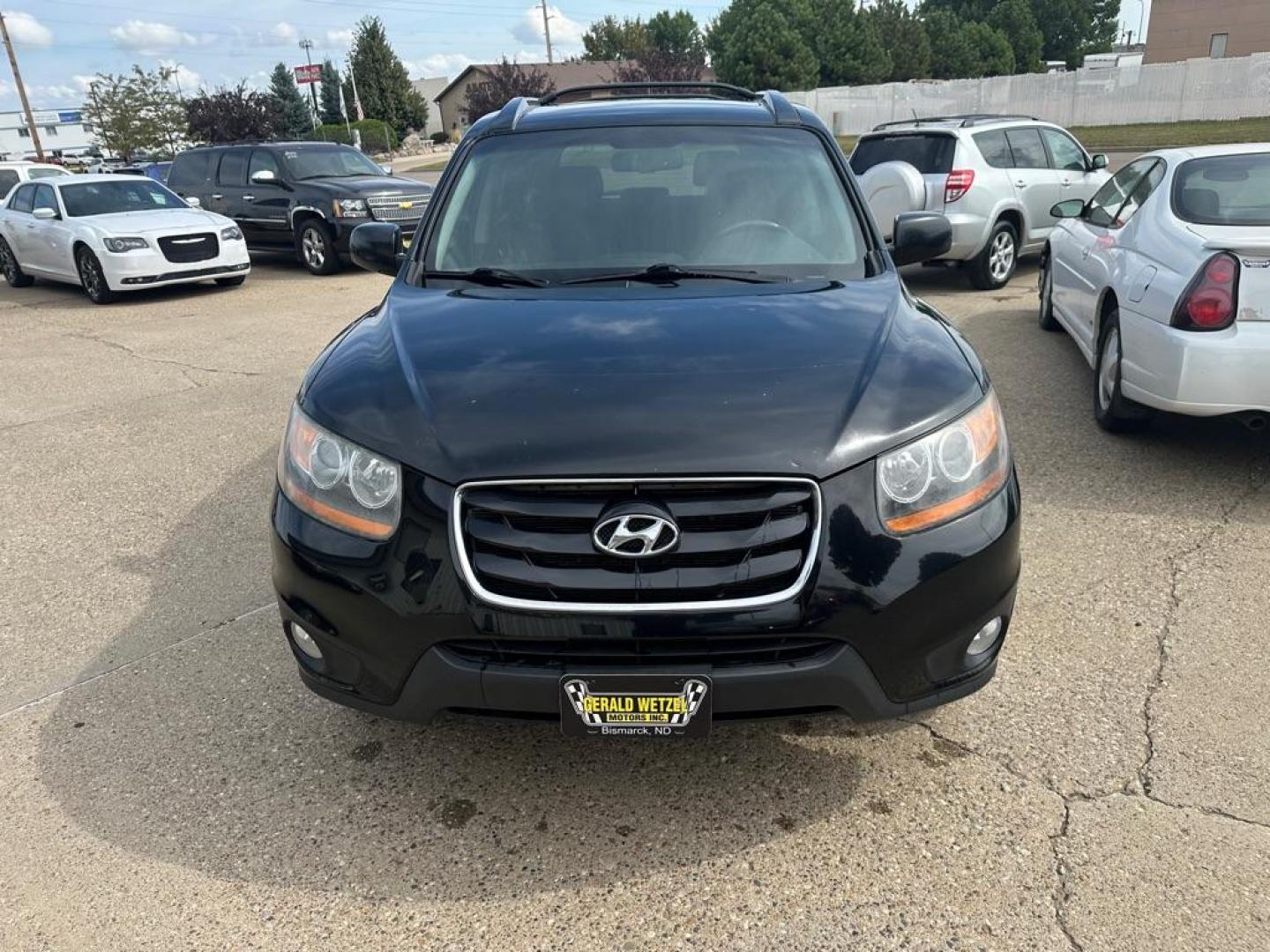2011 BLACK HYUNDAI SANTA FE SE (5XYZHDAGXBG) with an 3.5L engine, Automatic transmission, located at 1030 S. 22nd St., Bismarck, ND, 58504, (701) 258-0022, 46.793560, -100.758118 - Photo#13