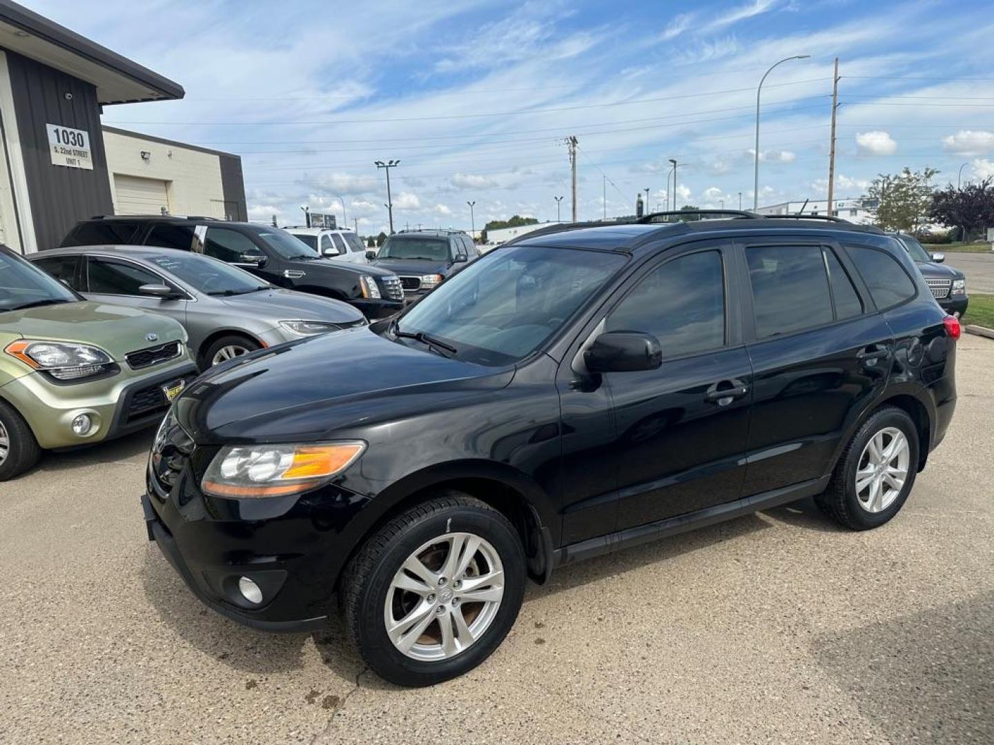 2011 BLACK HYUNDAI SANTA FE SE (5XYZHDAGXBG) with an 3.5L engine, Automatic transmission, located at 1030 S. 22nd St., Bismarck, ND, 58504, (701) 258-0022, 46.793560, -100.758118 - Photo#14