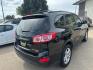 2011 BLACK HYUNDAI SANTA FE SE (5XYZHDAGXBG) with an 3.5L engine, Automatic transmission, located at 1030 S. 22nd St., Bismarck, ND, 58504, (701) 258-0022, 46.793560, -100.758118 - Photo#15
