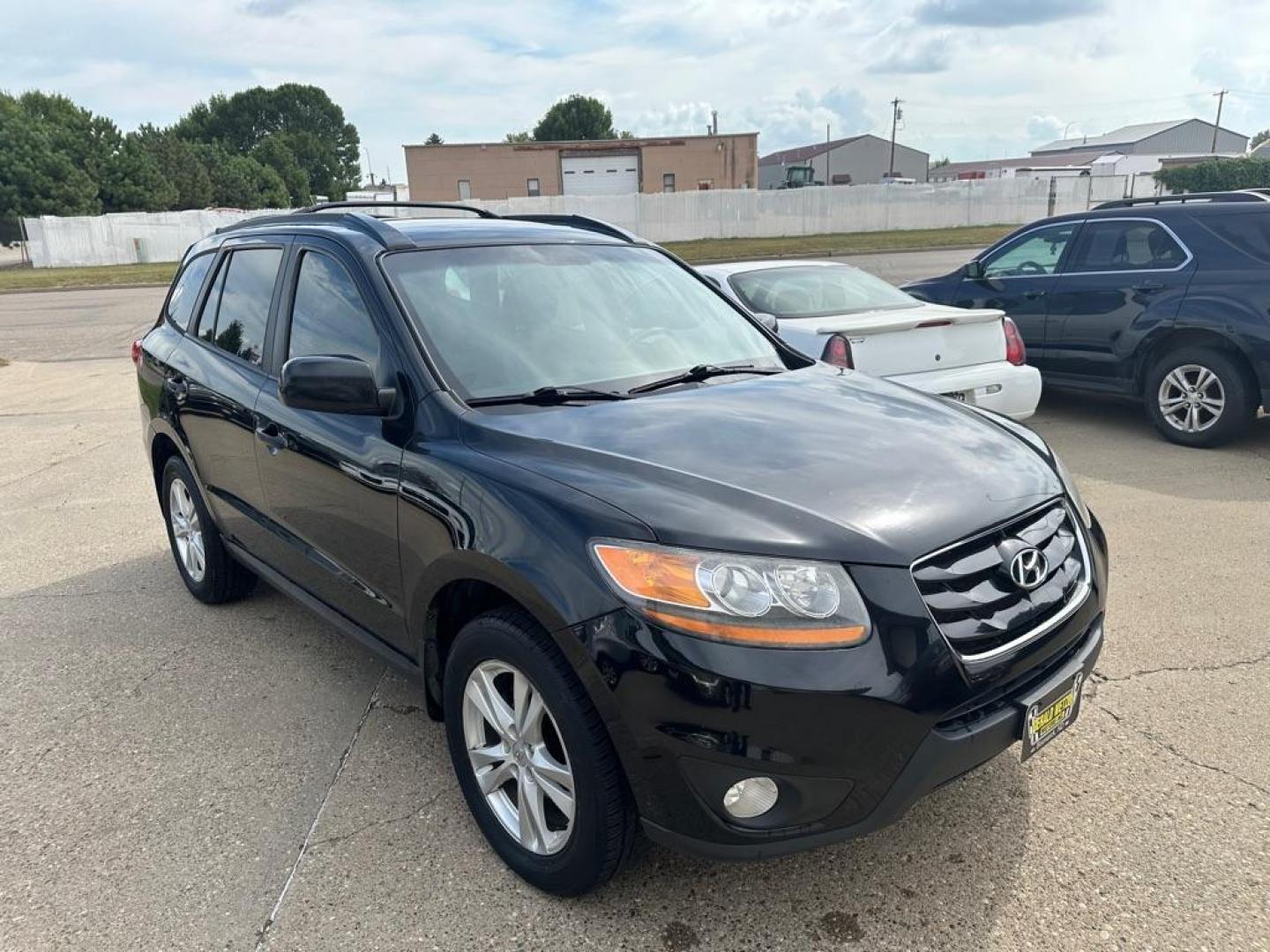 2011 BLACK HYUNDAI SANTA FE SE (5XYZHDAGXBG) with an 3.5L engine, Automatic transmission, located at 1030 S. 22nd St., Bismarck, ND, 58504, (701) 258-0022, 46.793560, -100.758118 - Photo#16