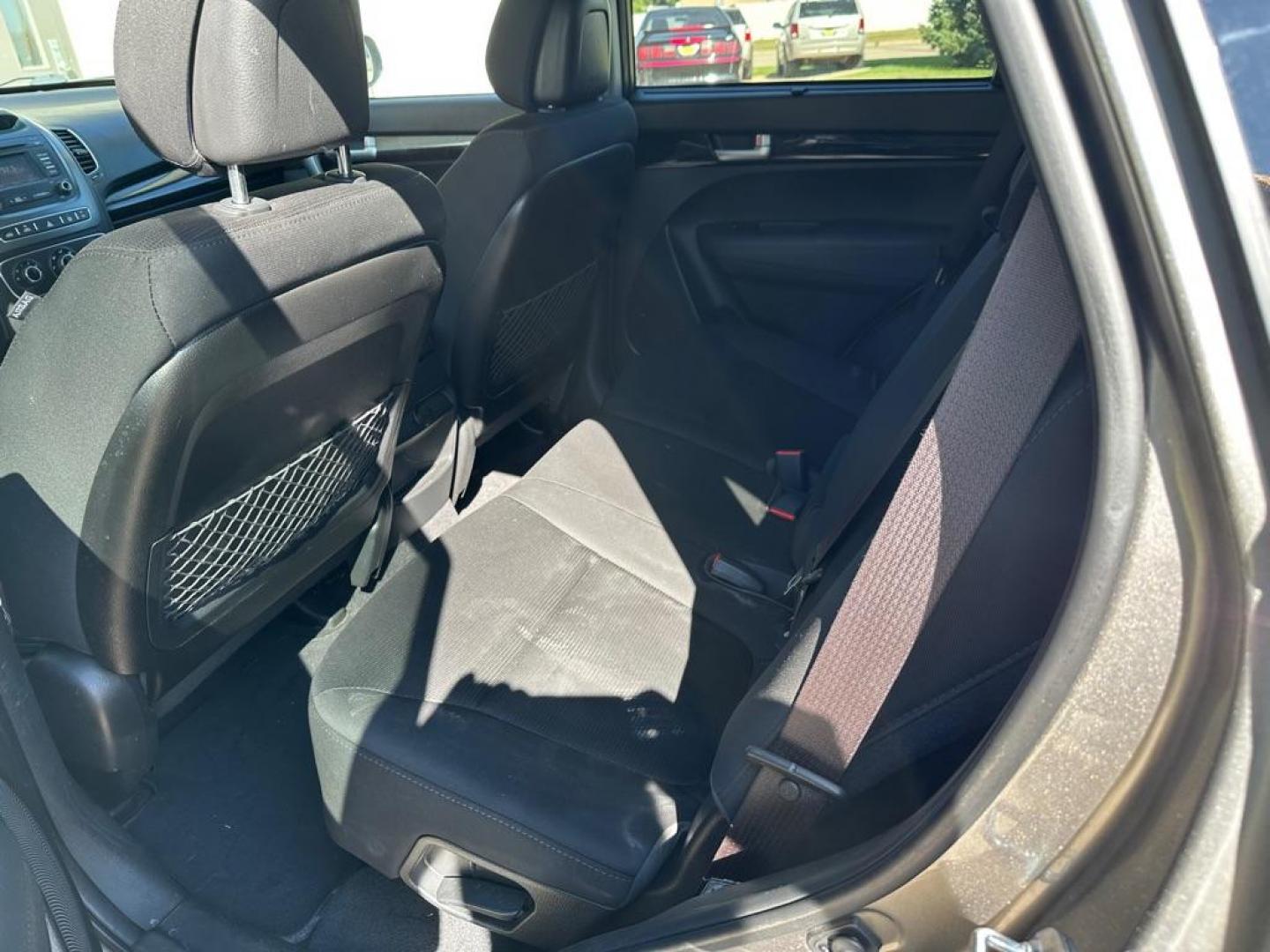 2015 KIA SORENTO LX (5XYKTDA66FG) with an 2.4L engine, Automatic transmission, located at 1030 S. 22nd St., Bismarck, ND, 58504, (701) 258-0022, 46.793560, -100.758118 - Photo#6