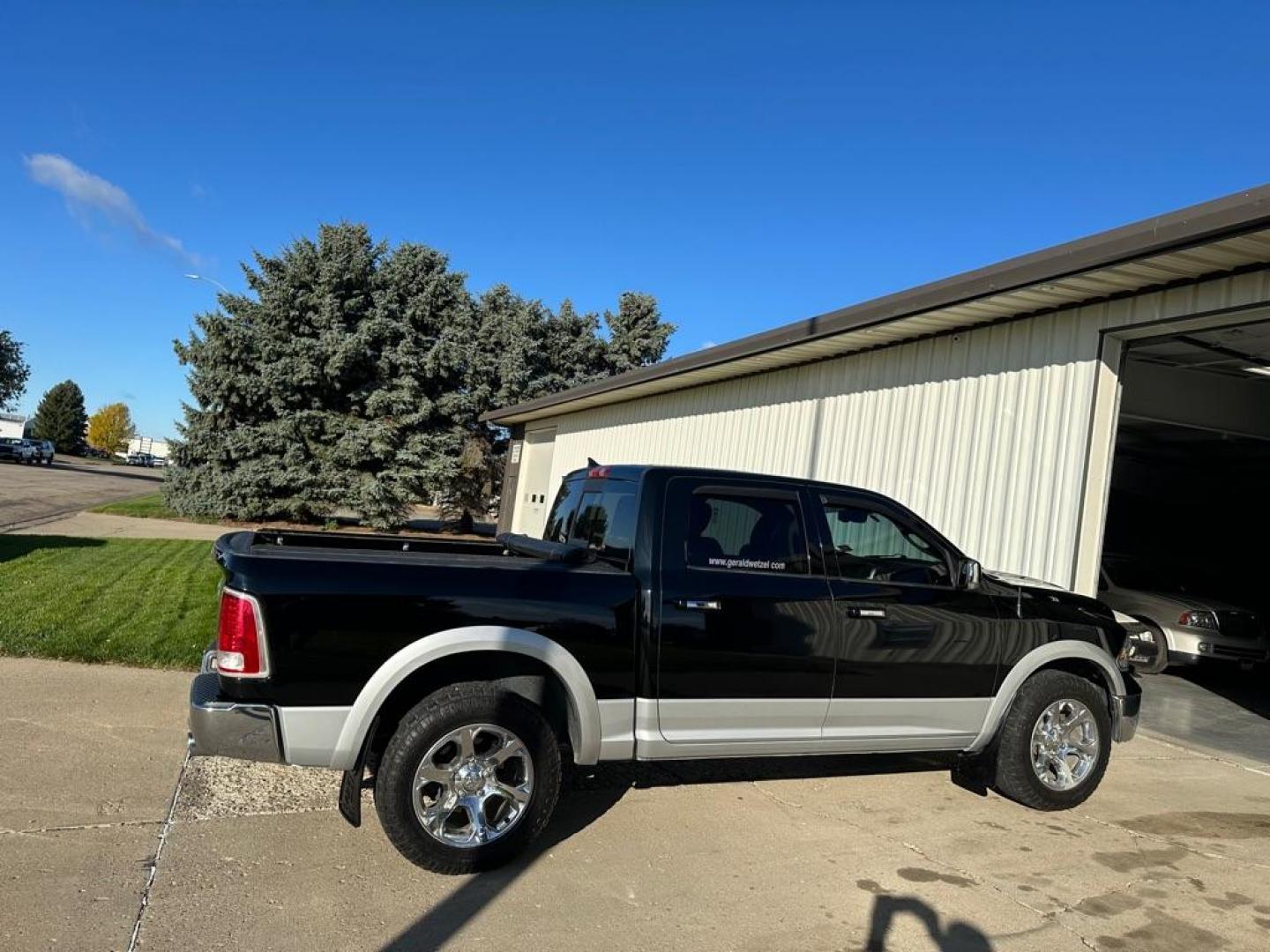 2014 RAM 1500 LARAMIE (1C6RR7NTXES) with an 5.7L engine, Automatic transmission, located at 1030 S. 22nd St., Bismarck, ND, 58504, (701) 258-0022, 46.793560, -100.758118 - NICE CLEAN TRUCK. ALL OPTIONS - Photo#4