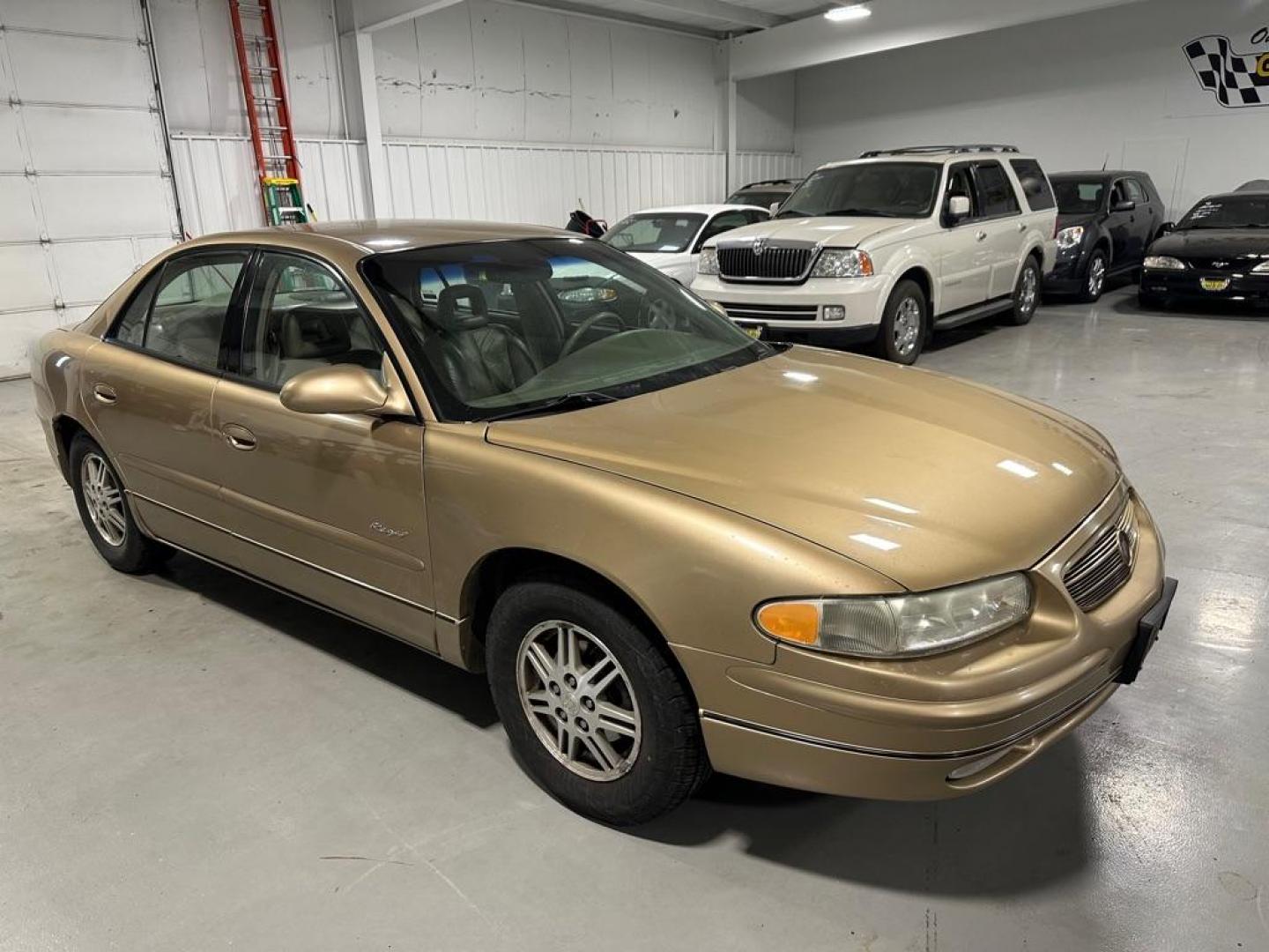 2001 GOLD BUICK REGAL LS (2G4WB55K511) with an 3.8L engine, Automatic transmission, located at 1030 S. 22nd St., Bismarck, ND, 58504, (701) 258-0022, 46.793560, -100.758118 - 3.8 LITER. New tires - Photo#1