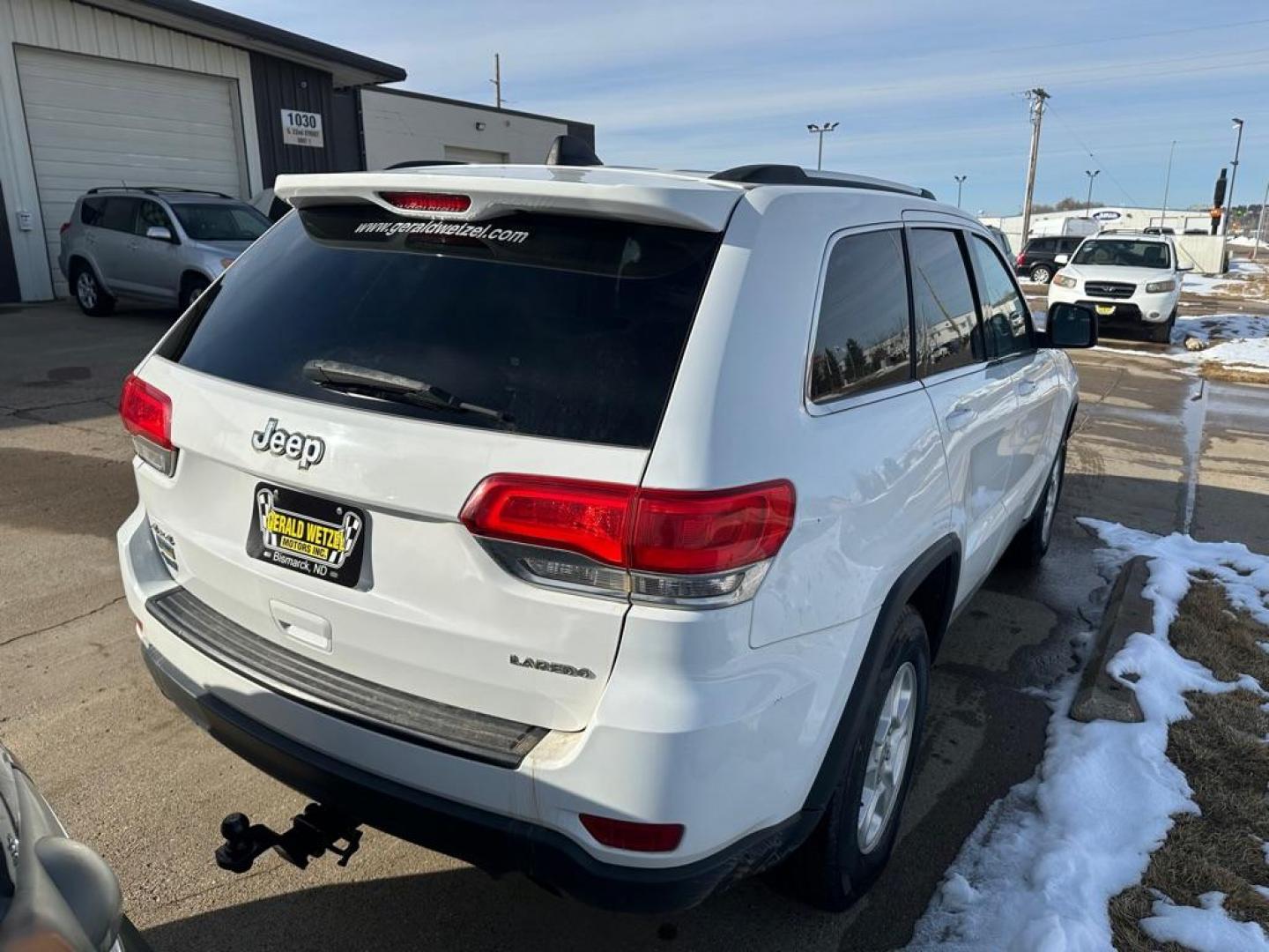2014 JEEP GRAND CHEROKEE LAREDO (1C4RJFAG8EC) with an 3.6L engine, Automatic transmission, located at 1030 S. 22nd St., Bismarck, ND, 58504, (701) 258-0022, 46.793560, -100.758118 - Photo#2