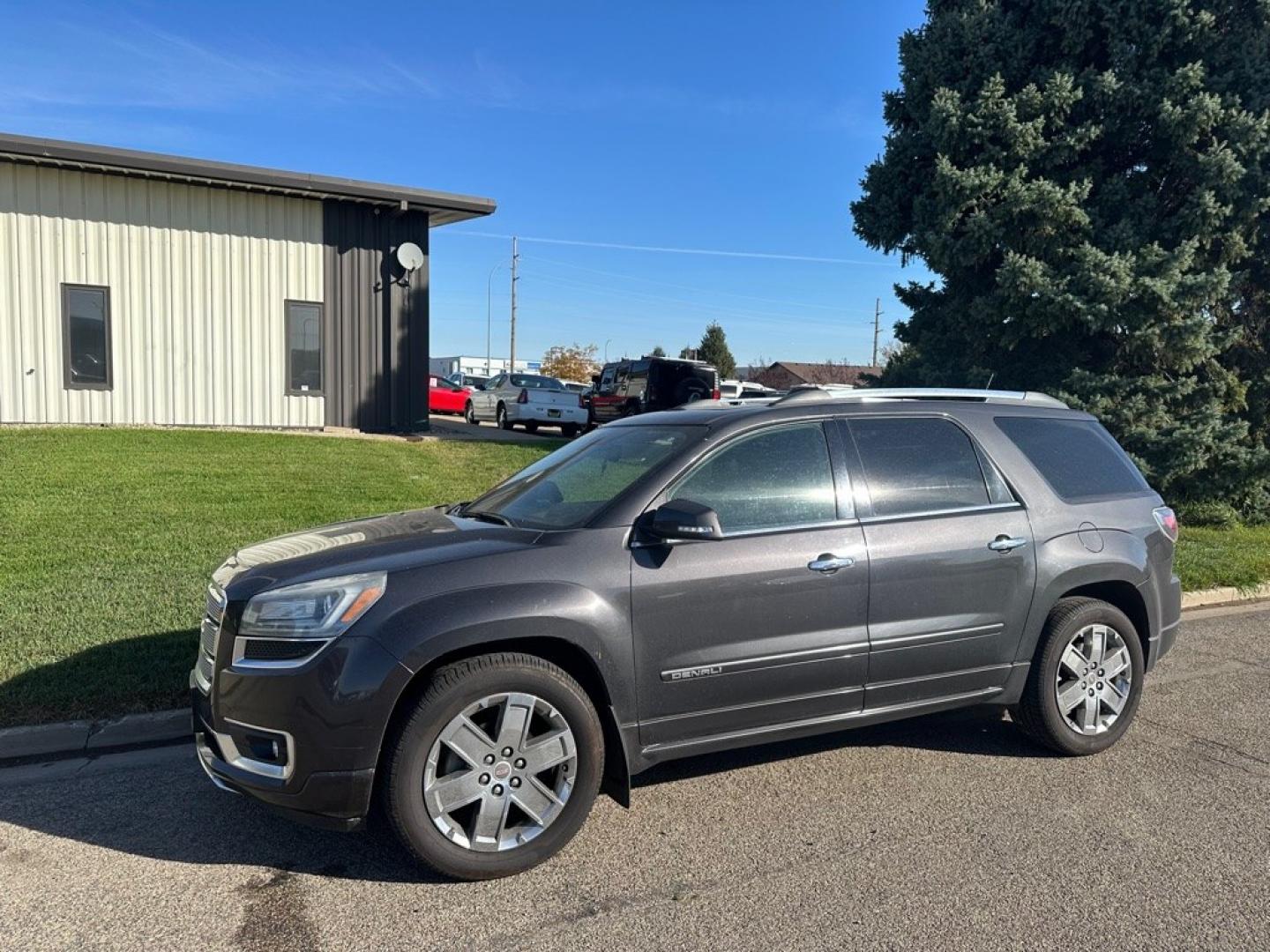 2014 BROWN GMC ACADIA DENALI (1GKKVTKD6EJ) with an 3.6L engine, Automatic transmission, located at 1030 S. 22nd St., Bismarck, ND, 58504, (701) 258-0022, 46.793560, -100.758118- Photo#0