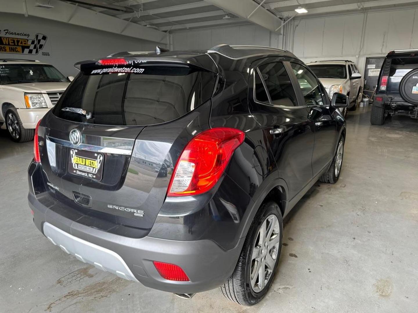 2013 BUICK ENCORE (KL4CJGSB8DB) with an 1.4L engine, Automatic transmission, located at 1030 S. 22nd St., Bismarck, ND, 58504, (701) 258-0022, 46.793560, -100.758118 - Photo#3