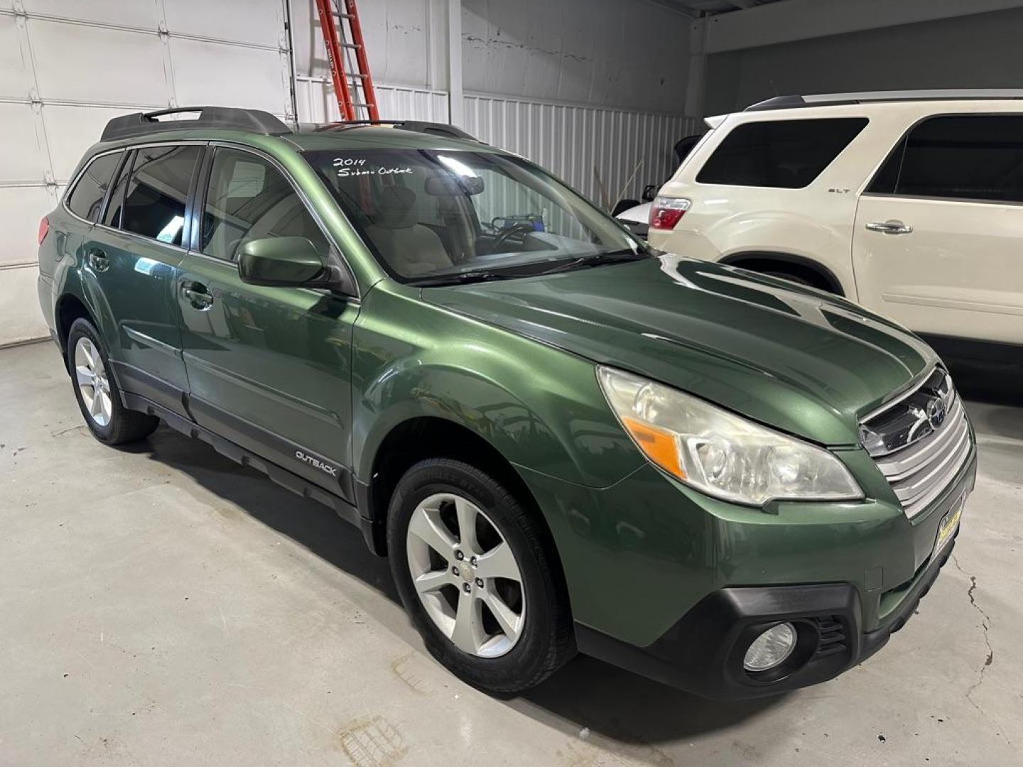 2014 SUBARU OUTBACK 2.5I PREMIUM (4S4BRCCC0E3) with an 2.5L engine, Continuously Variable transmission, located at 1030 S. 22nd St., Bismarck, ND, 58504, (701) 258-0022, 46.793560, -100.758118 - ;NICE CONDITION- Photo#2