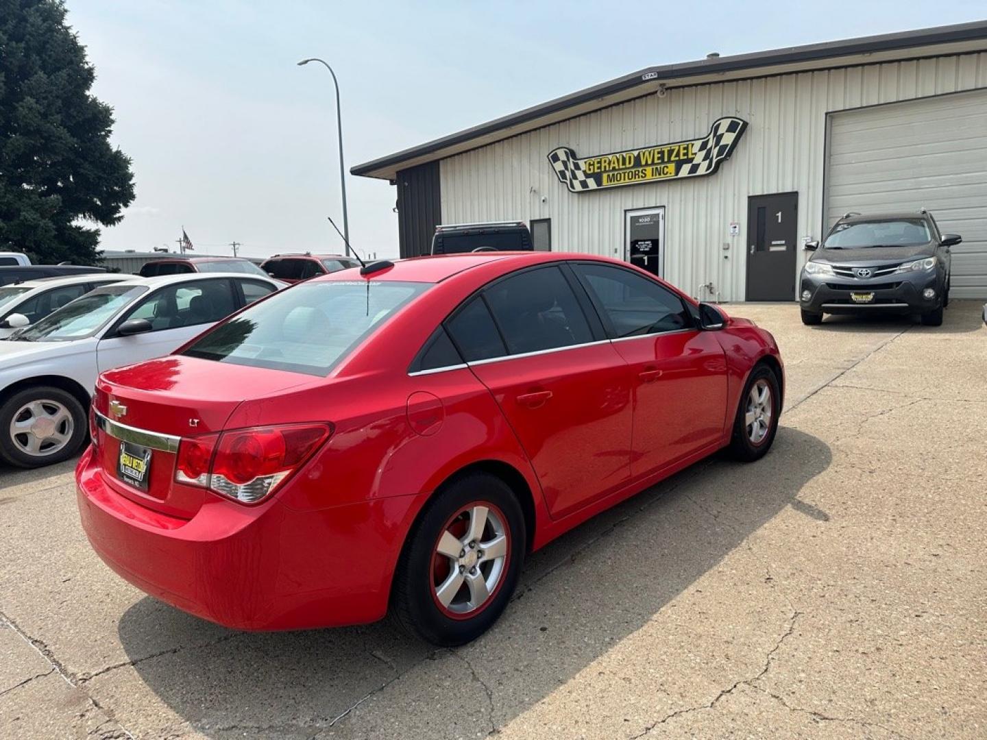 2015 RED CHEVROLET CRUZE LT (1G1PC5SB6F7) with an 1.4L engine, Automatic transmission, located at 1030 S. 22nd St., Bismarck, ND, 58504, (701) 258-0022, 46.793560, -100.758118 - NICE CLEAN CRUZE- Photo#2