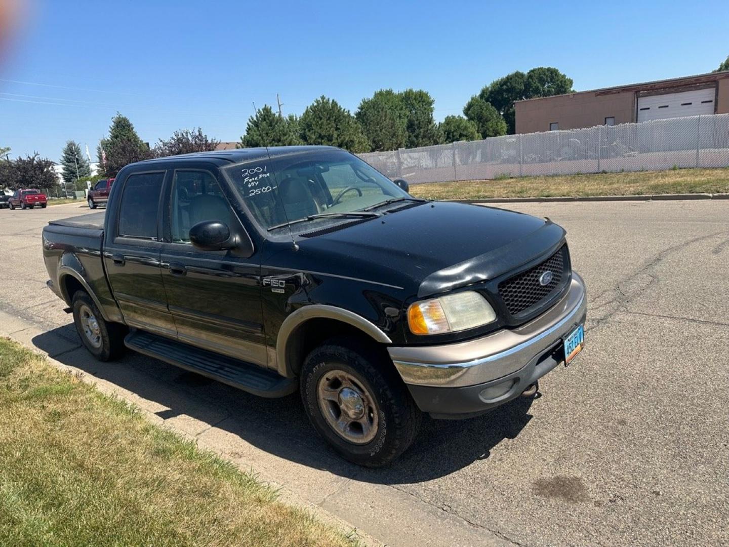 2001 BLACK FORD F150 SUPERCREW (1FTRW08L81K) with an 5.4L engine, Automatic transmission, located at 1030 S. 22nd St., Bismarck, ND, 58504, (701) 258-0022, 46.793560, -100.758118 - V8 4X4 CREW CAB- Photo#2