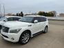 2012 WHITE INFINITI QX56 (JN8AZ2NE6C9) with an 5.6L engine, Automatic transmission, located at 1030 S. 22nd St., Bismarck, ND, 58504, (701) 258-0022, 46.793560, -100.758118- Photo#0