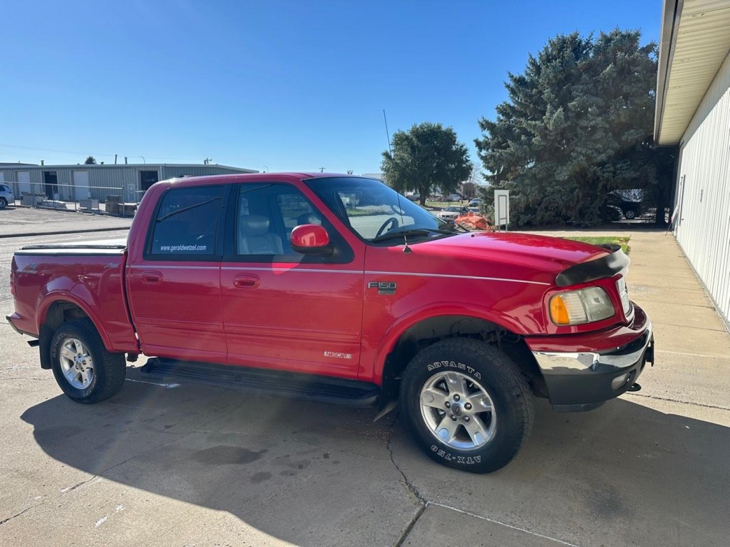 2002 RED FORD F150 SUPERCREW (1FTRW08L12K) with an 5.4L engine, Automatic transmission, located at 1030 S. 22nd St., Bismarck, ND, 58504, (701) 258-0022, 46.793560, -100.758118 - Nice Clean truck . CrewCab 4x4- Photo#3